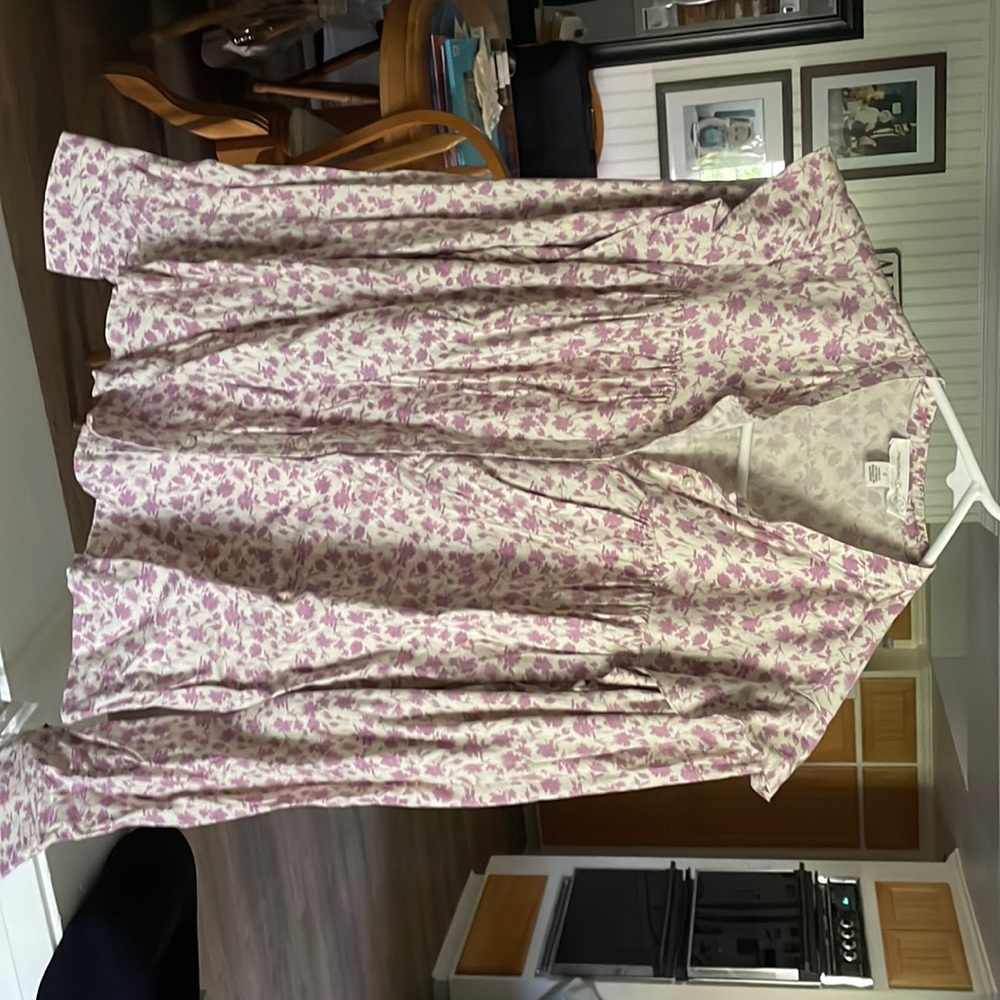 Woman’s small long sleeve blouse.